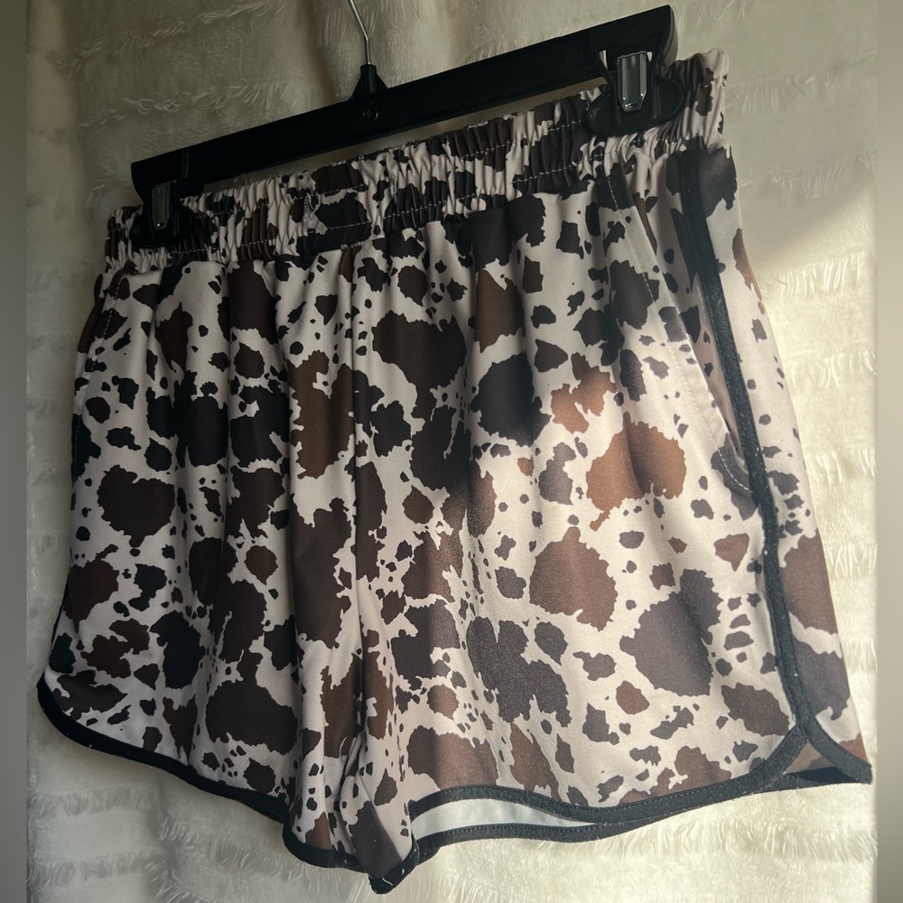Small Brown Cow Print Shorts. Elastic waist band/stretchy.